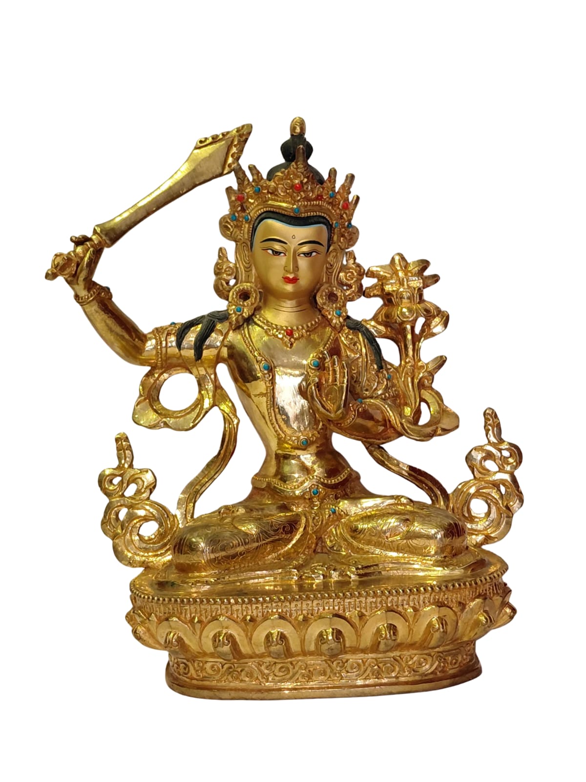 Gilded Manjushri statue with flaming sword of wisdom